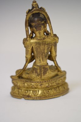 Lot 465 - Small and fine early Tibetan gilt bronze figure of a bodhisattva