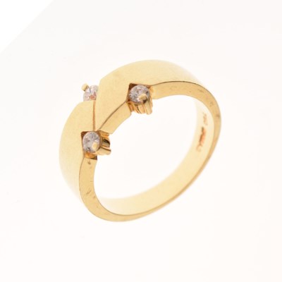 Lot 19 - Dress ring set three white stones