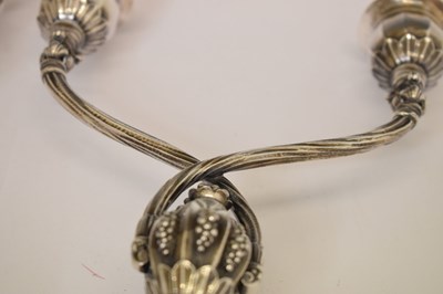 Lot 130 - Pair of Georg Jensen sterling silver two-branch candelabra