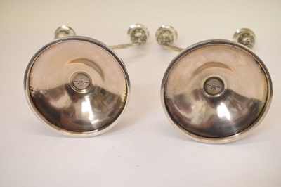 Lot 130 - Pair of Georg Jensen sterling silver two-branch candelabra