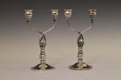 Lot 130 - Pair of Georg Jensen sterling silver two-branch candelabra