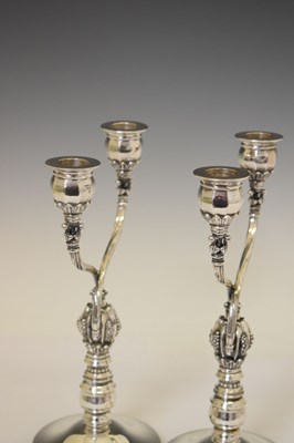 Lot 130 - Pair of Georg Jensen sterling silver two-branch candelabra