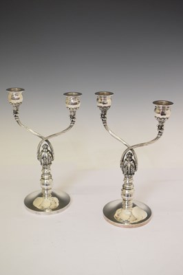 Lot 130 - Pair of Georg Jensen sterling silver two-branch candelabra