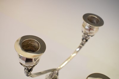 Lot 130 - Pair of Georg Jensen sterling silver two-branch candelabra