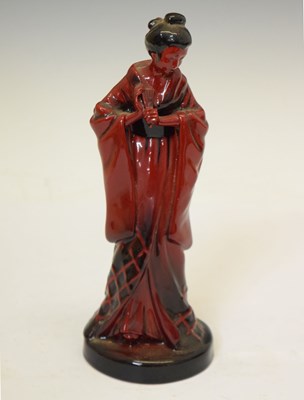 Lot 453 - Doulton flambé figure