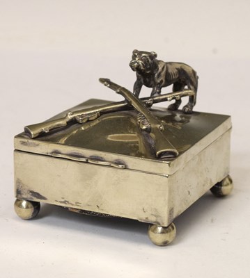 Lot 302 - Early 20th century silver plated box with hinged lid decorated with rifles and bulldog