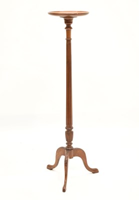 Lot 655 - Mahogany tripod torchere