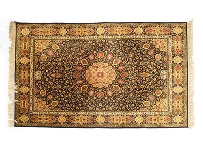 Lot 616 - Machine made wool carpet