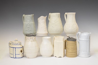 Lot 417 - Collection of relief-moulded stoneware jugs