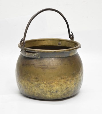 Lot 711 - Brass pot-bellied log bucket with handle