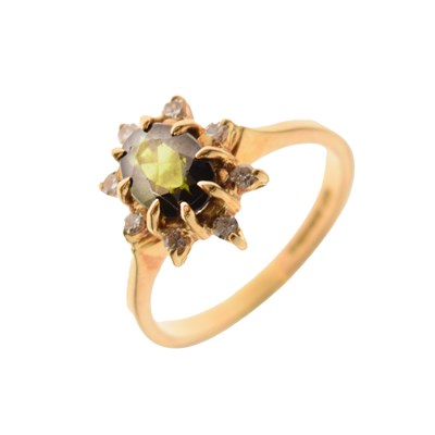 Lot 20 - 18ct gold dress ring set a faceted green stone