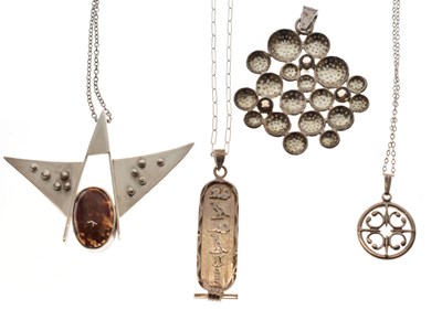 Lot 54 - Four silver pendants