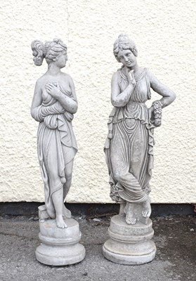 Lot 738 - Pair of composite garden statues of classical style maidens