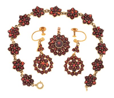 Lot 61 - Near matching suite of garnet set jewellery