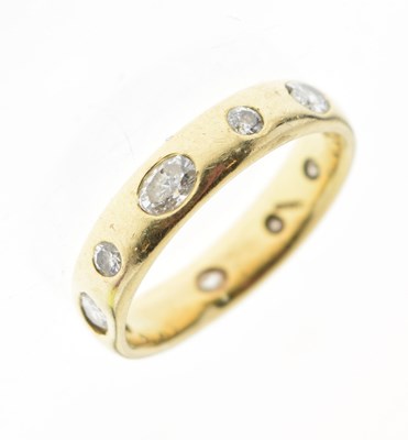 Lot 6 - Yellow metal wedding band