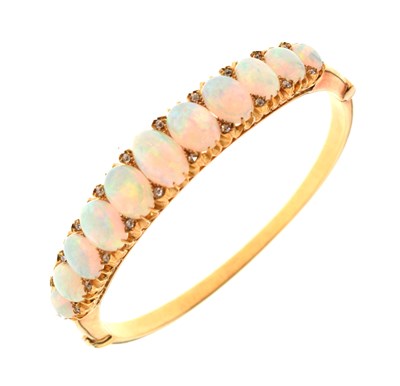 Lot 46 - Edwardian opal and diamond hinged bangle