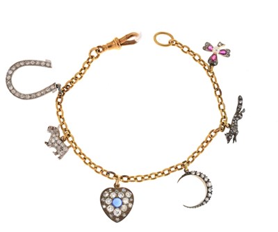Lot 93 - Charm bracelet, attached six various diamond set charms