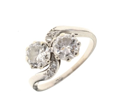 Lot 114 - Two-stone diamond crossover ring