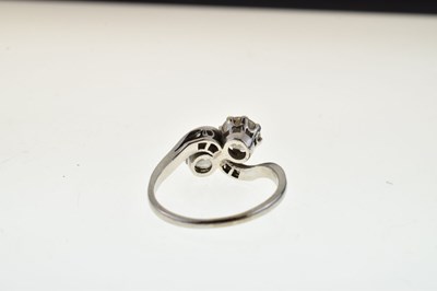 Lot 114 - Two-stone diamond crossover ring