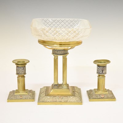 Lot 307 - Gilt metal three-piece garniture of pair of candlesticks and tazza with cut glass bowl