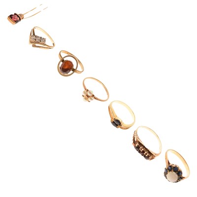 Lot 38 - Six stone set dress rings and a pendant