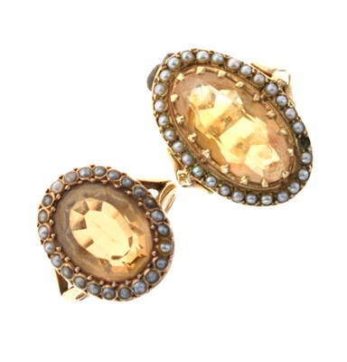 Lot 29 - Two citrine and seed pearl rings