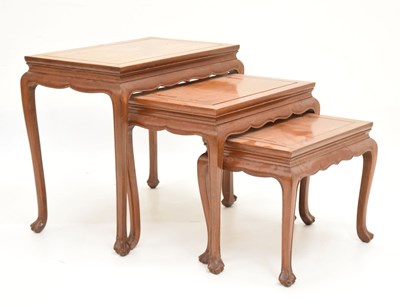 Lot 702 - Chinese hardwood nest of three occasional tables