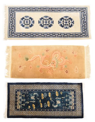 Lot 606 - Three various Chinese wool rugs