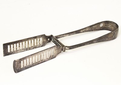 Lot 220 - Pair of George V Old English pattern silver asparagus tongs