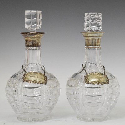 Lot 206 - Pair of George VI silver collared decanters together with two Elizabeth II silver decanter labels