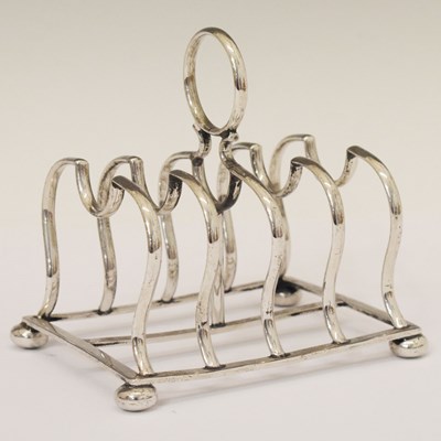 Lot 208 - Edward VII silver toast rack with loop handle