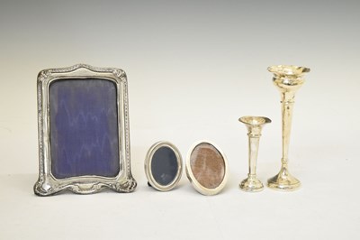 Lot 189 - Three silver-mounted easel photo frames and two silver bud vases