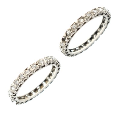 Lot 30 - Two platinum diamond full eternity rings