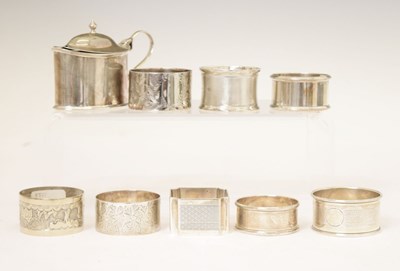 Lot 173 - Edward VII silver mustard pot, and seven silver napkin rings