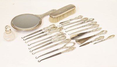 Lot 176 - Assorted silver-handled dressing table items, including button hooks, hand mirror, hair brush etc
