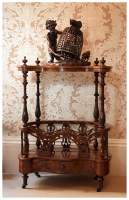 Lot 723 - Victorian figured walnut serpentine fronted Canterbury whatnot