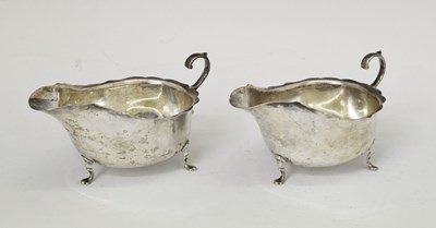 Lot 214 - Pair of George V silver sauceboats