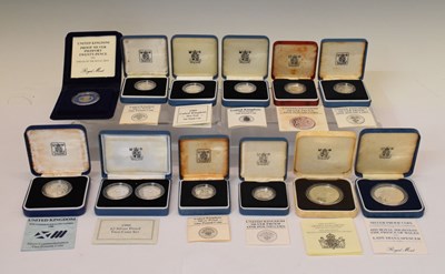 Lot 247 - Twelve Royal Mint silver proof presentation coins to include crown, £1, £2 etc