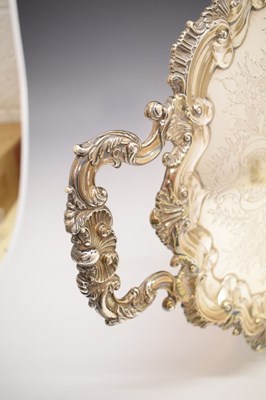 Lot 105 - Edward VII silver oval tray with scroll and shell moulded handles