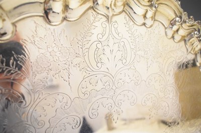 Lot 105 - Edward VII silver oval tray with scroll and shell moulded handles
