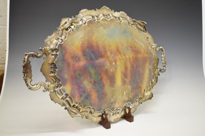 Lot 105 - Edward VII silver oval tray with scroll and shell moulded handles