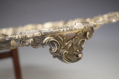 Lot 105 - Edward VII silver oval tray with scroll and shell moulded handles