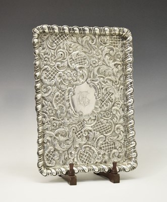 Lot 104 - Edward VII silver rectangular tray with all-over embossed rococo decoration