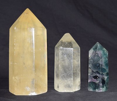 Lot 283 - Two citrine and one fluorite obelisk specimen