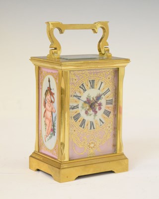 Lot 588 - Gilt metal and porcelain panelled carriage timepiece