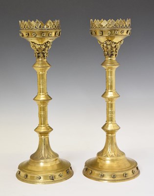 Lot 227 - Pair of reproduction brass Gothic Revival pricket candlesticks