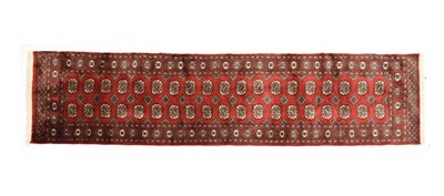 Lot 601 - Belouch-type red ground wool runner