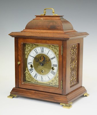 Lot 588 - Reproduction walnut cased chiming bracket clock by Franz Hermle
