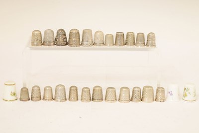 Lot 179 - Collection of silver thimbles, together with a small quantity of base metal and ceramic thimbles