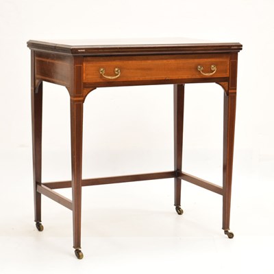Lot 664 - Edwardian inlaid mahogany writing table